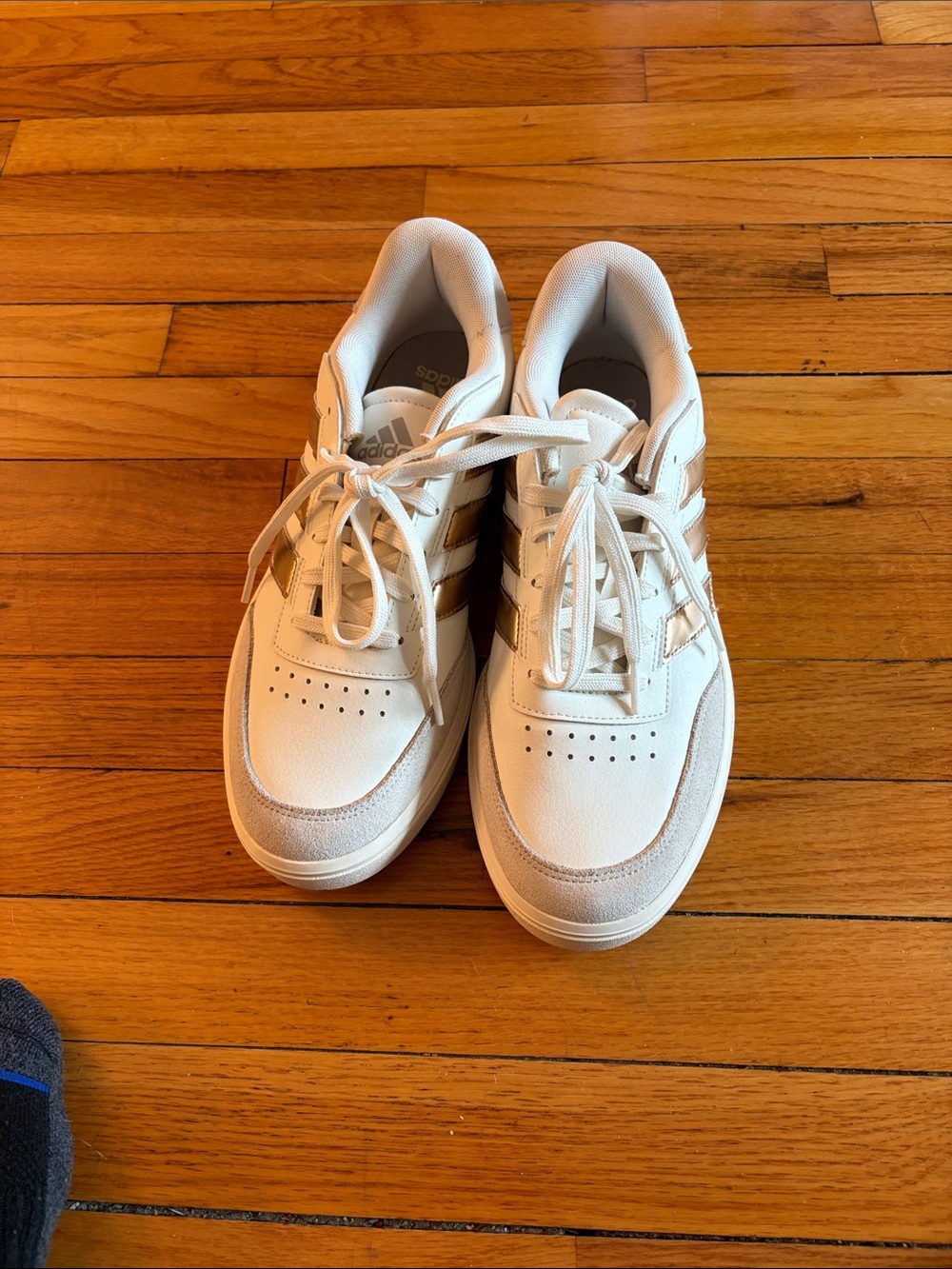adidas White Sneakers with Gold Stripes